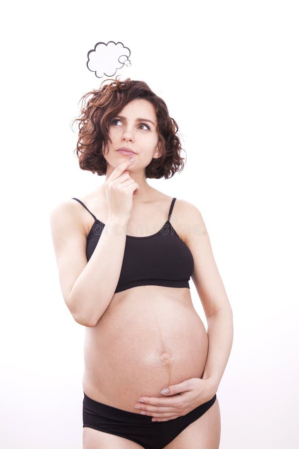 Schwangere Frau denkt an ihr Baby stockbilder Schwangere Frau denkt an ihr Baby stockbilder