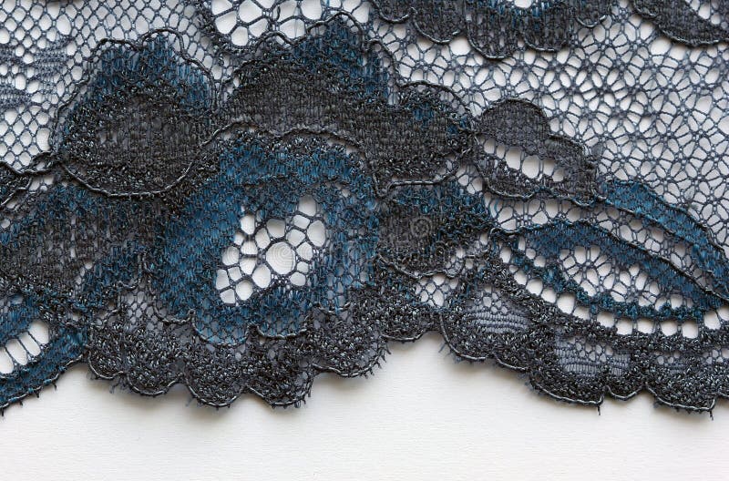 Schwarze und blaue Blumen schnüren sich materiellen Beschaffenheitsmakroschuß lizenzfreies stockbild Schwarze und blaue Blumen schnüren sich materiellen Beschaffenheitsmakroschuß lizenzfreies stockbild
