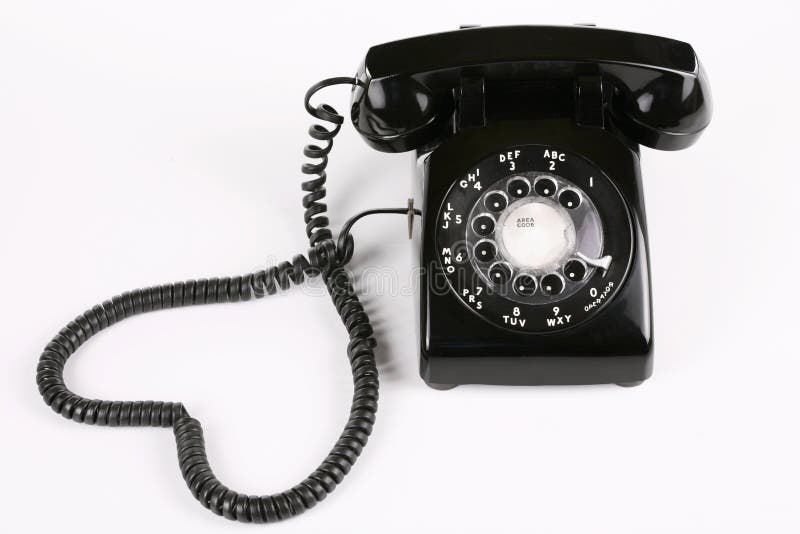 Old fashioned black rotary phone. Old fashioned black rotary phone