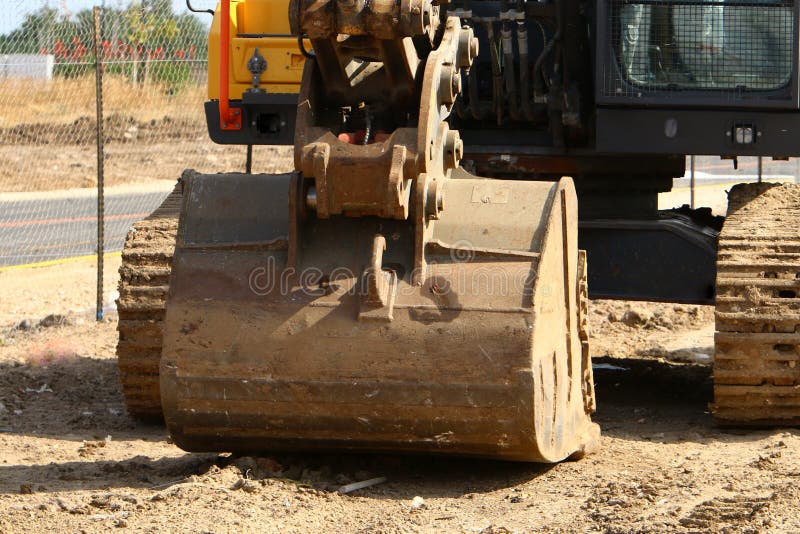 Heavy construction machinery, tractors and bulldozers at a construction site in Israel. Heavy construction machinery, tractors and bulldozers at a construction site in Israel