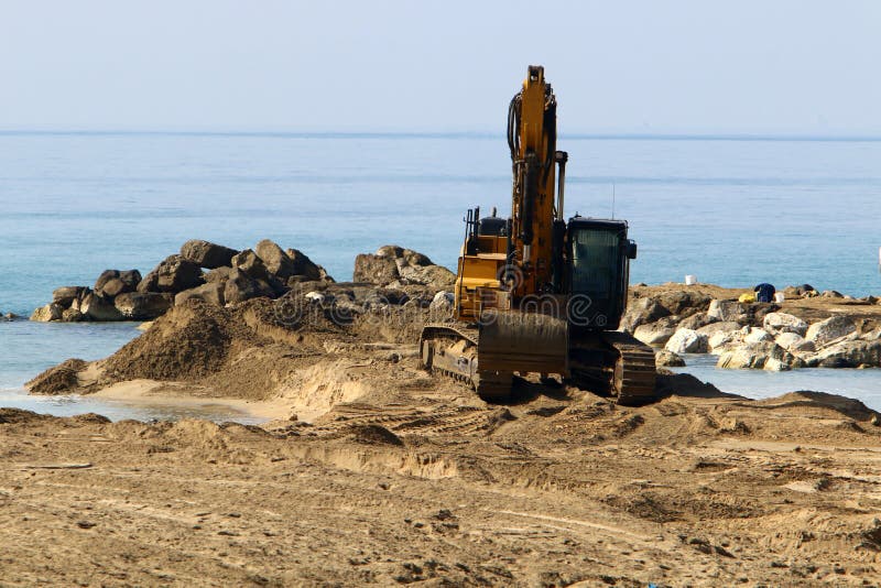 Heavy construction machinery, tractors and bulldozers at a construction site in Israel. Heavy construction machinery, tractors and bulldozers at a construction site in Israel