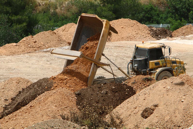 Heavy construction machinery, tractors and bulldozers at a construction site in Israel. Heavy construction machinery, tractors and bulldozers at a construction site in Israel