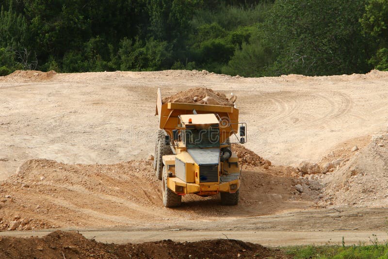 Heavy construction machinery, tractors and bulldozers at a construction site in Israel. Heavy construction machinery, tractors and bulldozers at a construction site in Israel