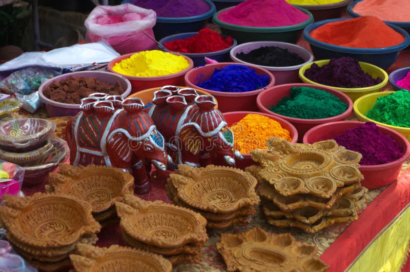 A beautifully crafted lamp and handicrafts colors kept for sale for festival celebration. A beautifully crafted lamp and handicrafts colors kept for sale for festival celebration.