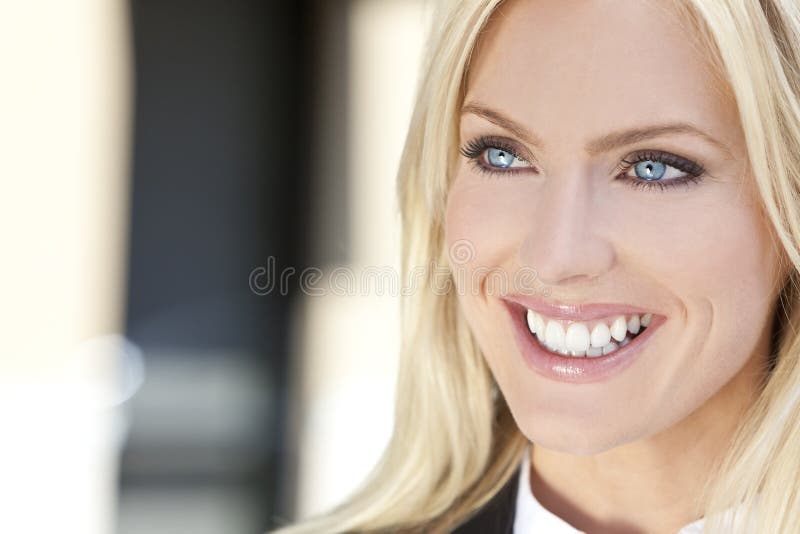 Natural light portrait of a beautiful blond woman with blue eyes. Natural light portrait of a beautiful blond woman with blue eyes