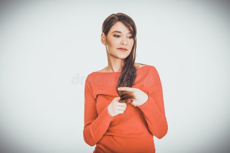 Schöne junge durchdachte Studentenfrau stockfotografie Schöne junge durchdachte Studentenfrau stockfotografie