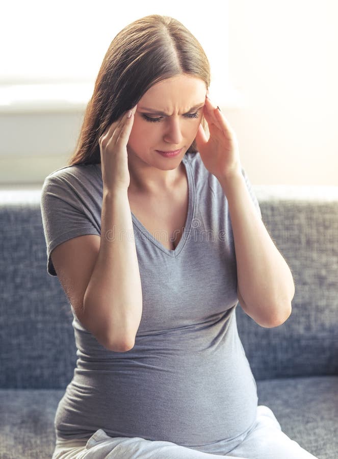 Schöne müde schwangere Frau stockfoto Schöne müde schwangere Frau stockfoto