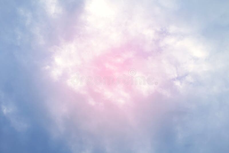 The sky fluffy pink blue soft purple multicolored background beautiful sky with pink clouds, two tone sky background colorful. The sky fluffy pink blue soft purple multicolored background beautiful sky with pink clouds, two tone sky background colorful