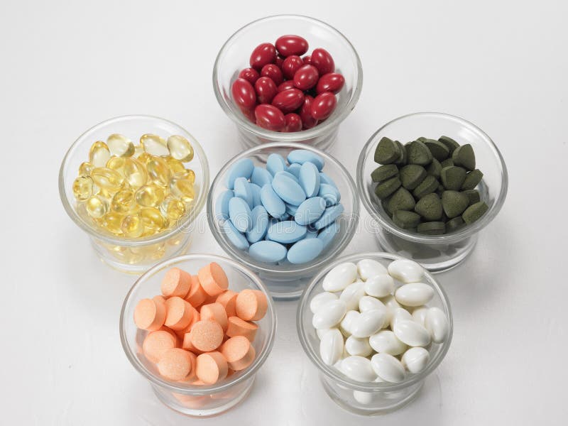 Close up of bowls of various medicine. Close up of bowls of various medicine