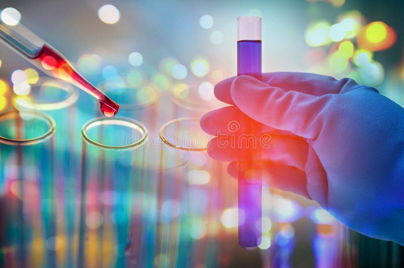 science hand holding laboratory test tubes , laboratory equipment , science background stock images science hand holding laboratory test tubes , laboratory equipment , science background stock images