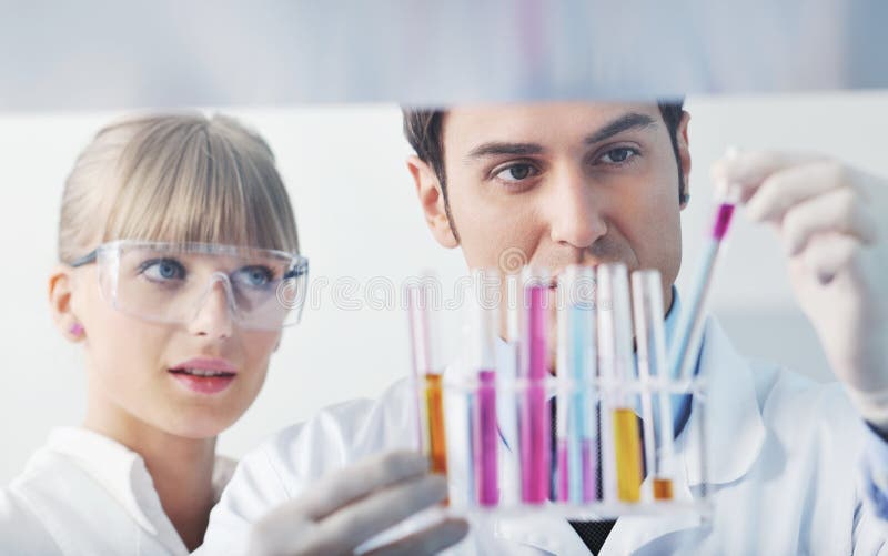 Science people in bright lab