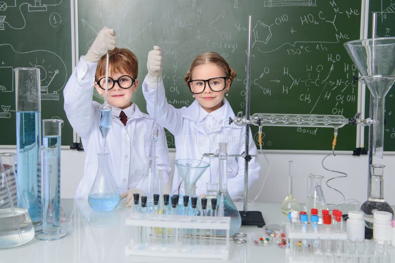 Children scientists in lab stock image. Image of male - 119464653