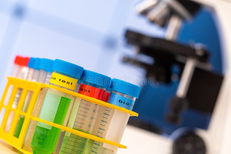 Scientific Experiment in Microbiological Lab. Microscope and Test Tube