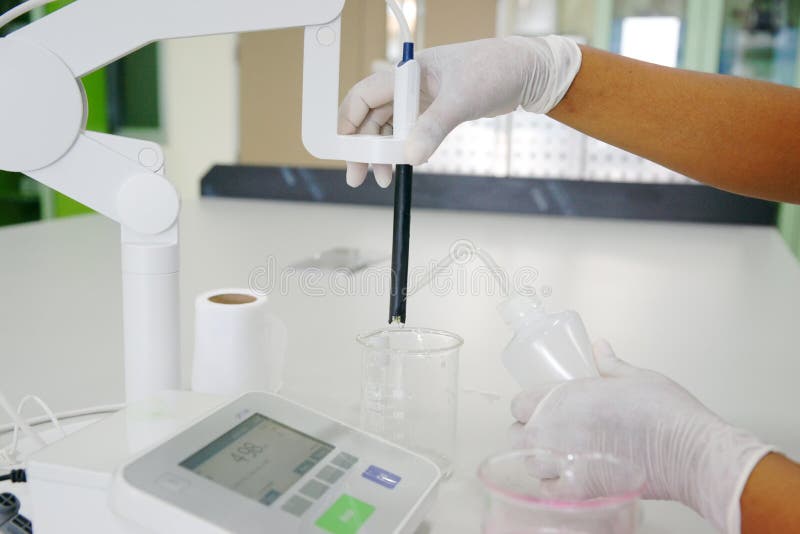 The scientist with pH meter royalty free stock photos The scientist with pH meter royalty free stock photos