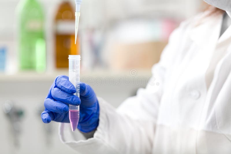Scientist with pipette and test royalty free stock photos