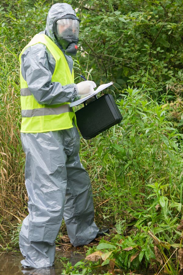 Scientist Researcher in Protective Suit Records Environmental Research