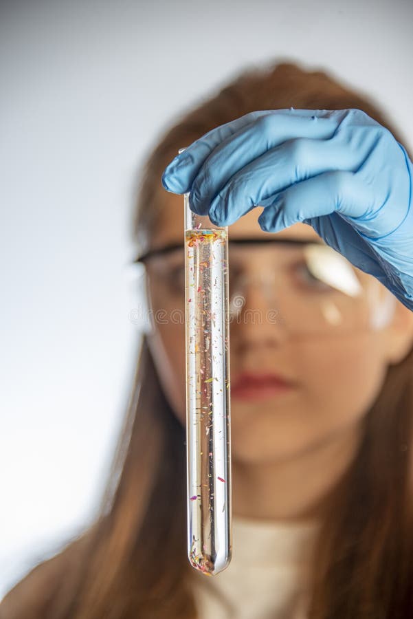 Scientist Student are Working in Laboratory Micro Plastics in a Test