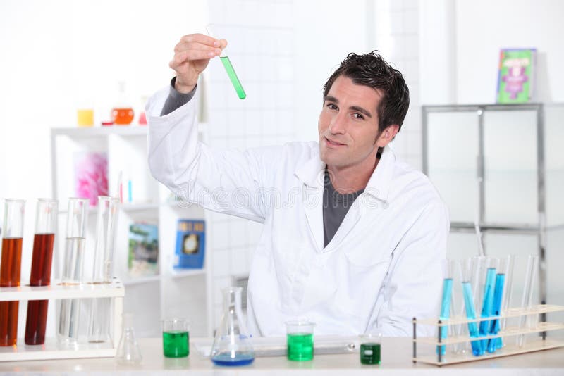 four scientists in white lab coats standing indoors and on scientist lab coat wallpapers