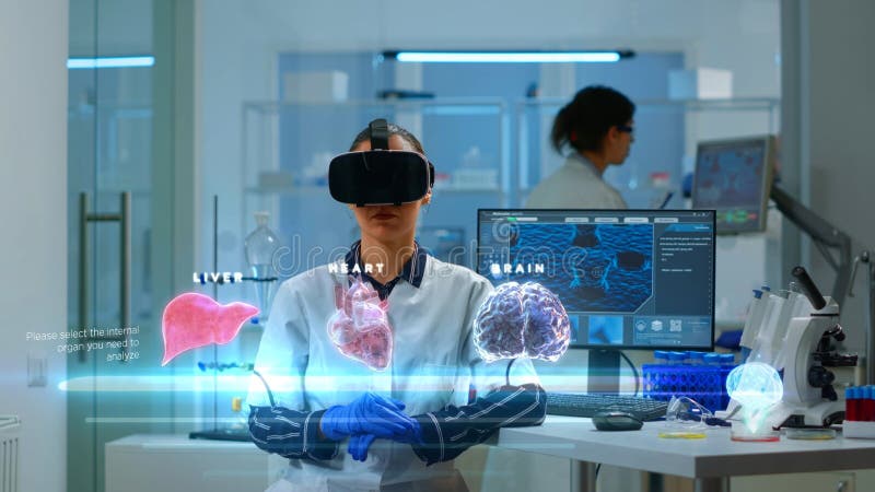 Scientist woman in clinic using VR stock images