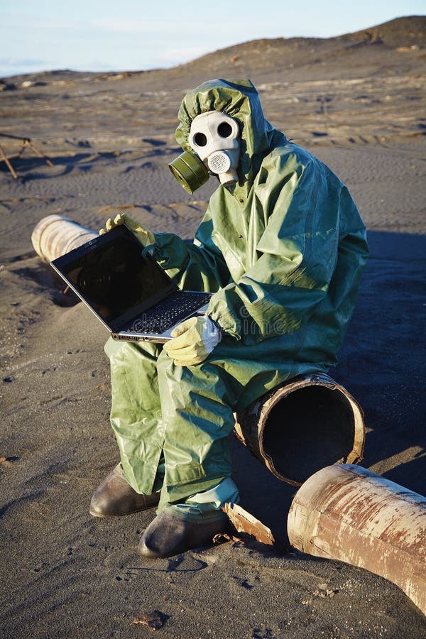 Scientist working with computer - infected area. Scientist working with the computer in the infected areas stock photos Scientist working with computer - infected area. Scientist working with the computer in the infected areas stock photos
