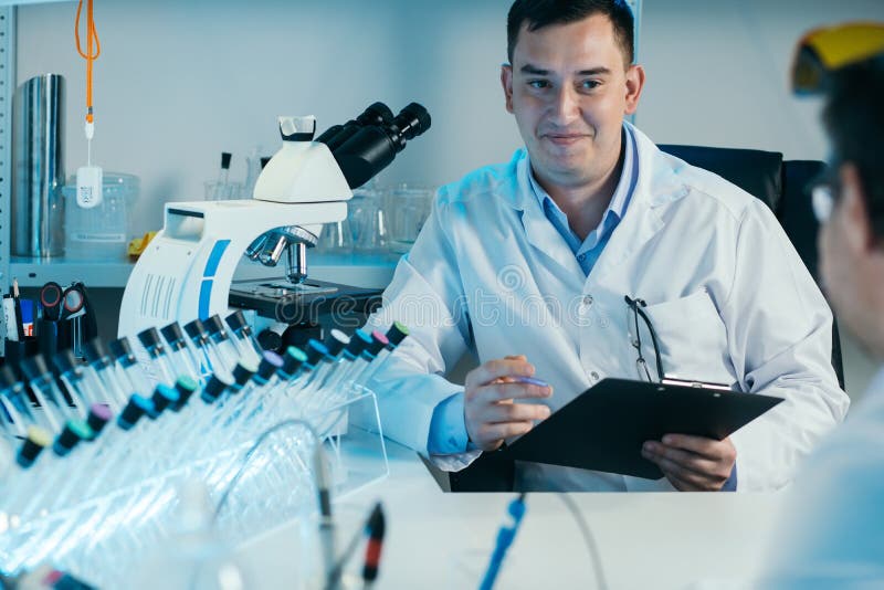 Scientist Working With Microscope In Lab Laboratory Research Concept