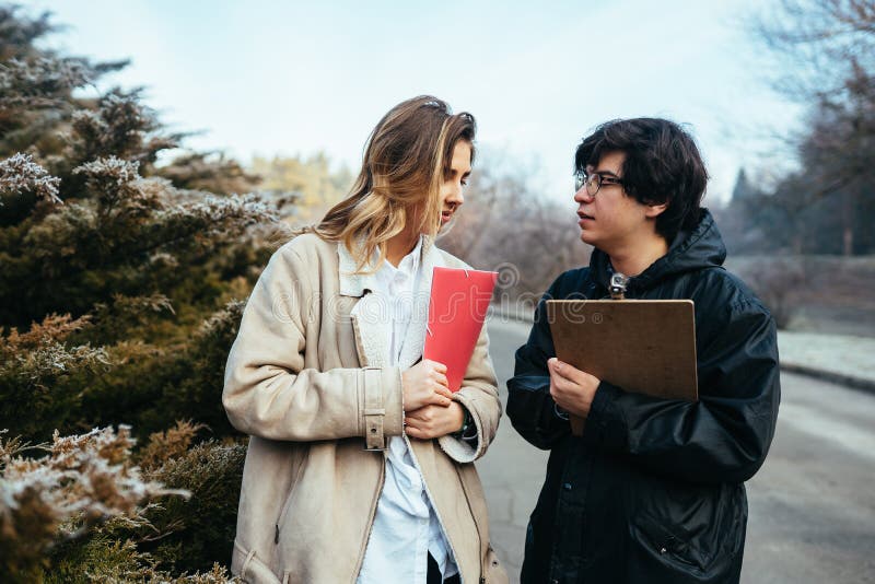 Scientists are studying plant species in the forest. stock photography