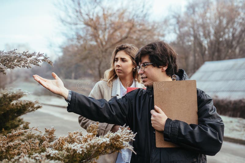 Scientists are studying plant species in the forest. royalty free stock images