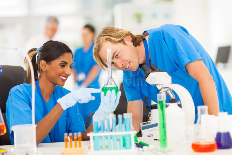Scientists studying substances stock image