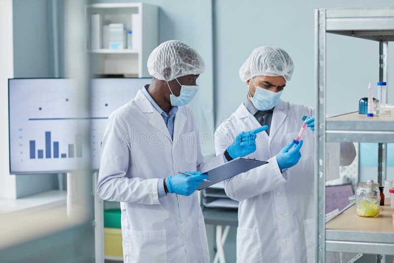 Scientists Working with Analysis in the Lab Stock Image Image of