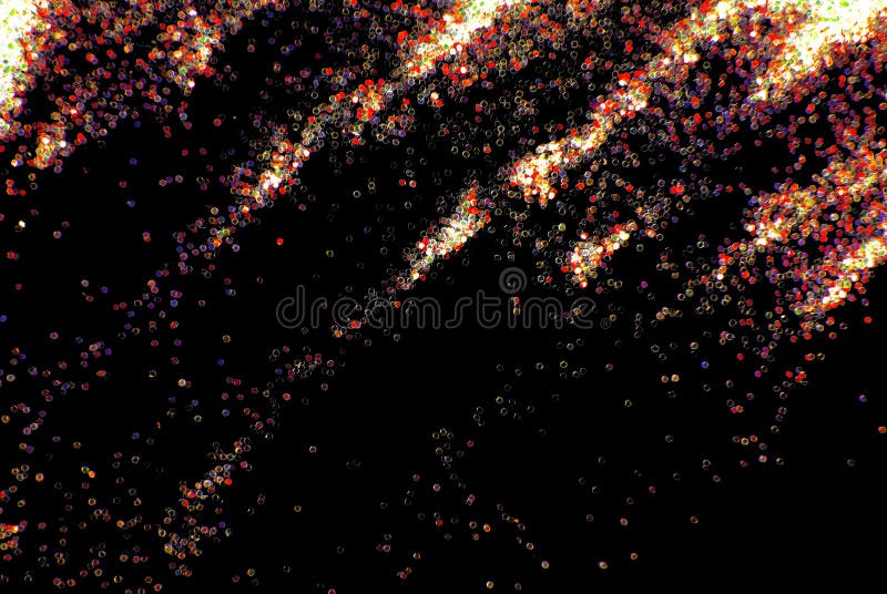 Scintilla di scintillio sul nero fotografie stock libere da diritti Scintilla di scintillio sul nero fotografie stock libere da diritti