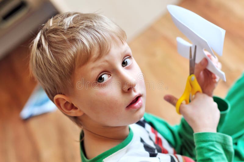 333 One Boy Scissors Stock Photos, High-Res Pictures, and Images - Getty  Images