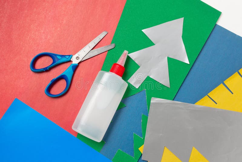 Colored Cardboard Sheets with Scissors and Paper Glue Stock Image