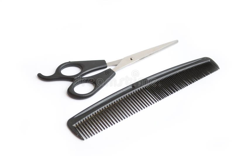Scissors and comb stock photography