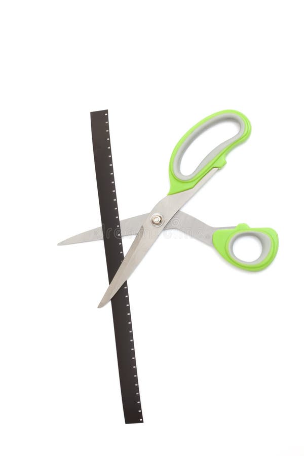 Scissors cut a tape film stock image. Image of perforation 21786159