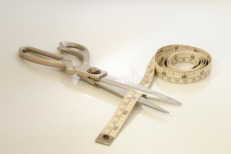 Scissors Cutting A Measuring Tape Stock Photo Image of overweight