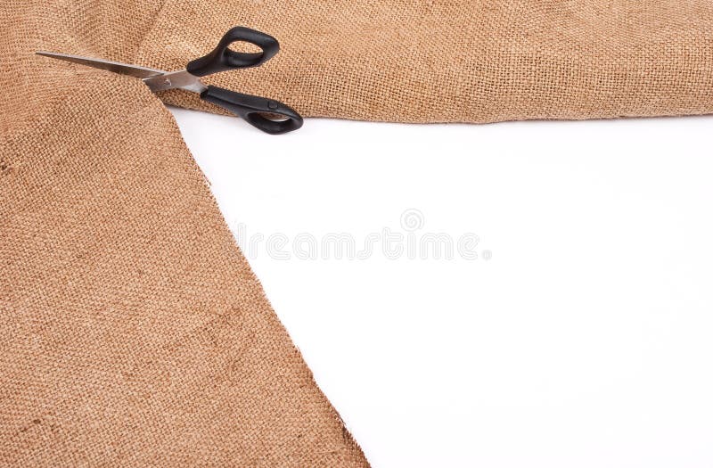 Scissors cutting sackcloth material