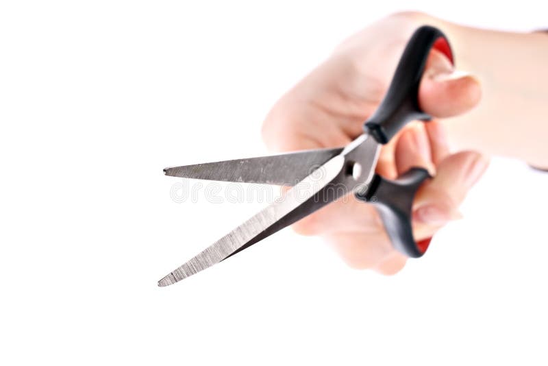 Scissors in hand isolated royalty free stock photo