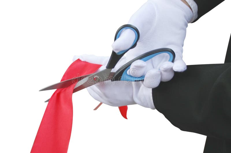 Scissors in the hand with white glove