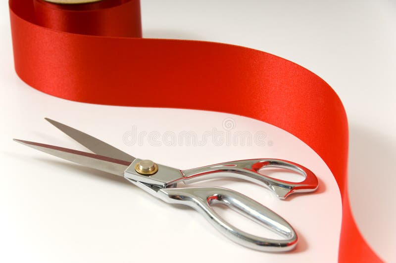 Scissors and red ribbon