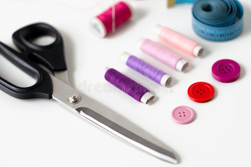 Scissors, Sewing Buttons, Threads and Tape Measure Stock Photo Image