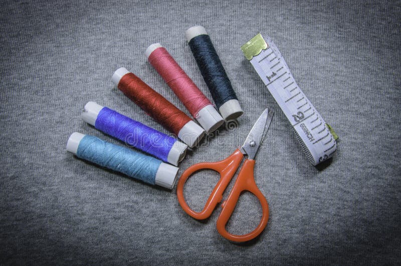 Scissors and sewing thread stock illustration. Illustration of sewing