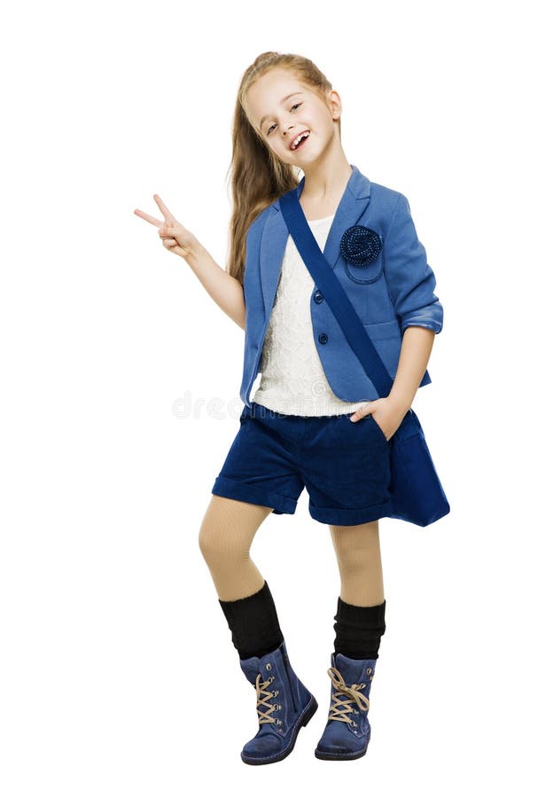 Scolara nel segno di mostra uniforme di vittoria Ragazza della scuola dello studente immagini stock Scolara nel segno di mostra uniforme di vittoria Ragazza della scuola dello studente immagini stock