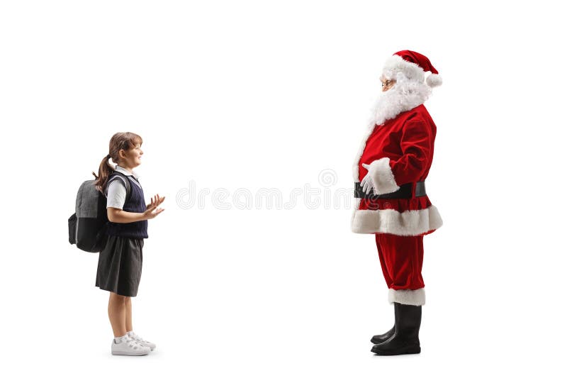 Scolarita vorbind cu Moș Crăciun royalty free stock photos