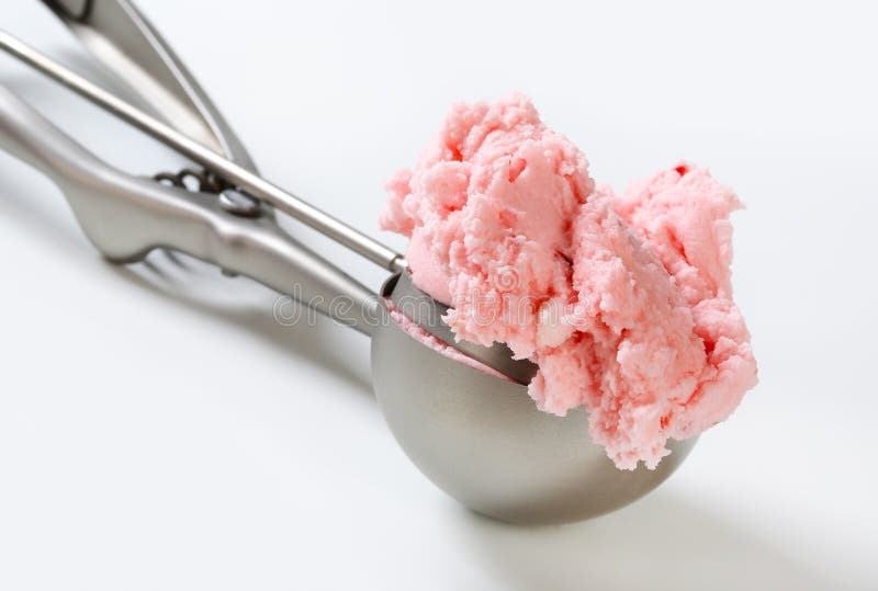 Scoop of pink ice cream stock photo. Image of utensil 33094624