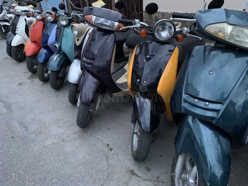 Scooter motorbikes row stock image. Image of motor, vacation 225921609