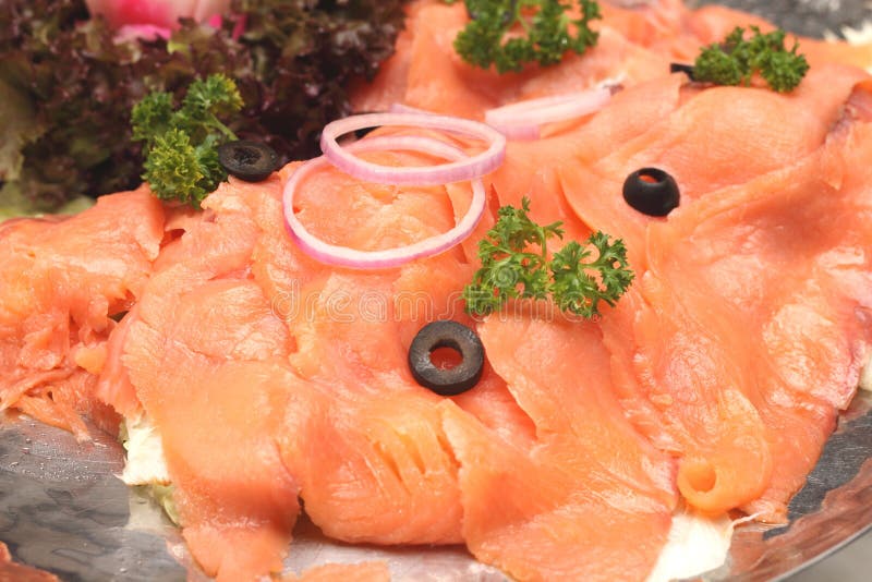 Scorrevole del salmone affumicato immagini stock libere da diritti Scorrevole del salmone affumicato immagini stock libere da diritti