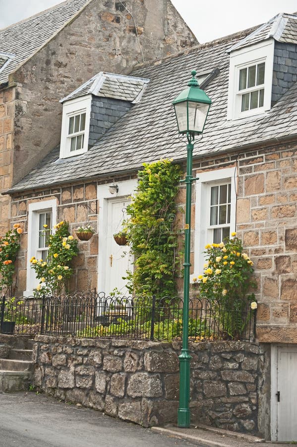 Scottish terraced cottage with roses