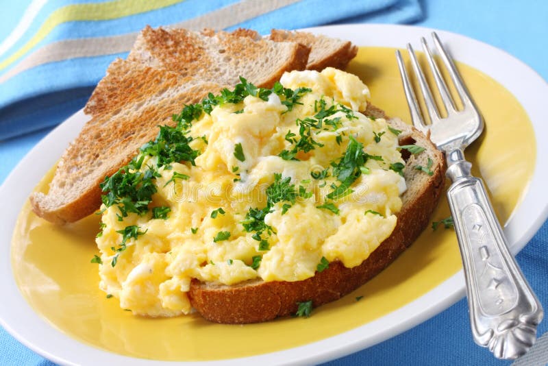 Scrambled Eggs on English Muffin Stock Photo - Image of horizontal ...
