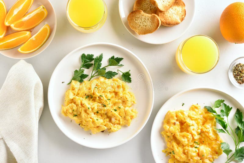 Scrambled Eggs for Breakfast Stock Photo - Image of drink, leaves