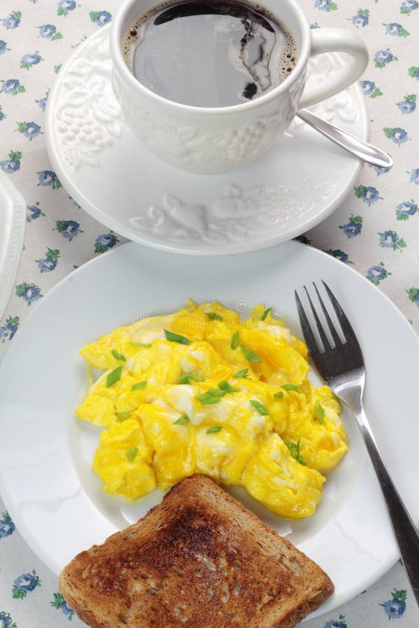 Scrambled Eggs, Cup of Coffee and Toast. Stock Photo Image of plate